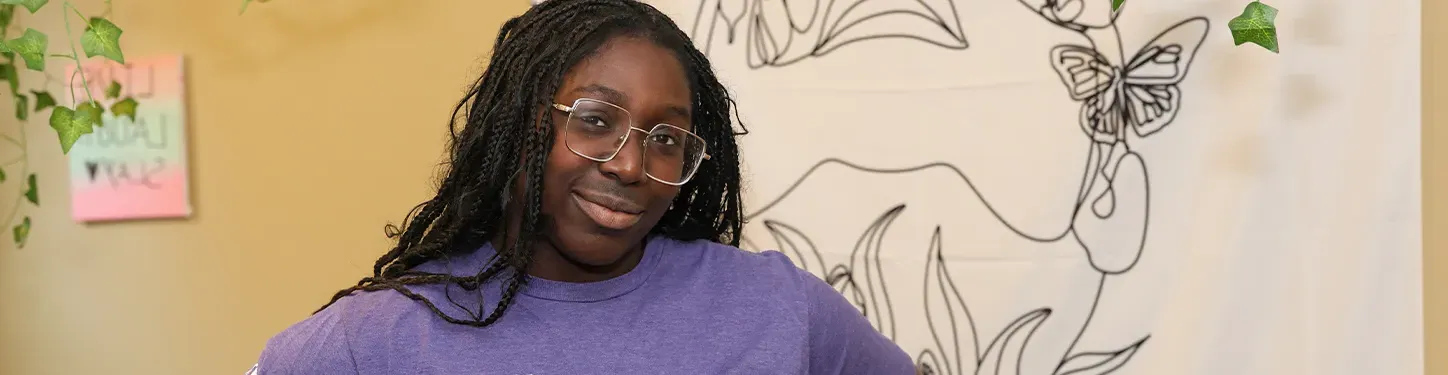 photo of a student in a purple t shirt